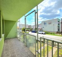 The balcony of a family house on Lesná Street in Čaňa with a view of the street.