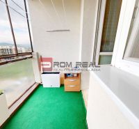 The balcony of a 3-room apartment on L. Novomestkého in Pezinok with a view of modern buildings.
