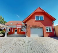 Family house on Gútorská Road in Šamorín with a garage and a paved courtyard.