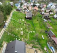 Aerial view of a plot in Rokytov, ideal for living, with a grassy area.