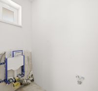 Interior with installed Geberit module in the bathroom of a family house.