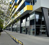 The exterior of the building on Tomášikova Street in Bratislava - Ružinov with colorful balconies.