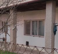 A family house in Nové Sady with an outdoor veranda and a wooden roof.