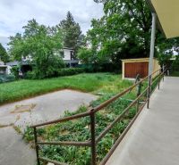 A family house on K Dolnej stanici Street in Trenčín with a spacious garden and greenery.