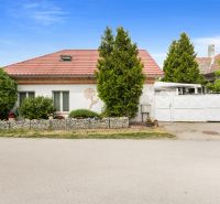 A family house on Robotnícka Street in Tomášov with a garden and a modern roof.