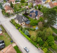 Aerial view of a family house with a large garden on Kpt. Jaroša Street in Trenčín.