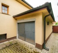 A garage in a family house on Kpt. Jaroša Street in Trenčín with tiles.