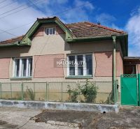 A family house in Veľké Kršteňany with a fence and traditional architecture.