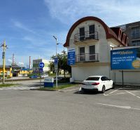 The exterior on Južná trieda in Košice, the Barca district, including office buildings.