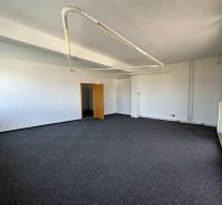 Offices with carpet and lighting.