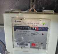 Three-phase electricity meter by Krížik, type E3S-20T/1S, measuring consumption in kWh.