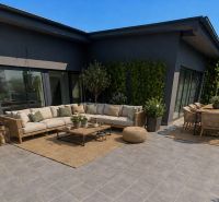 Terrace of a 3-room apartment in the town of Svit with seating and greenery.