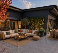 A terrace in a 3-room apartment in Svit with comfortable seating and flowers.