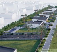 Nové Zámky, Land - housing: New houses surrounded by greenery, a walkway, and a children's playground.
