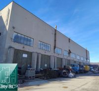 Warehouses and halls on Staviteľská Street in Bratislava III with an industrial area.