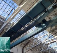 A large space with a steel structure and a glass roof in Warehouses and Halls.