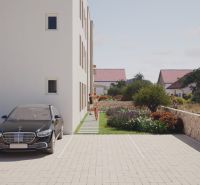 Exterior of a 3-bedroom apartment in Sukošan with a landscaped garden and parking space.