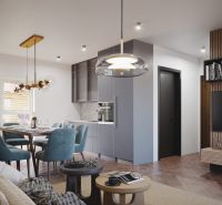 Living area with a kitchenette and a wooden decor floor in a 3-room apartment.
