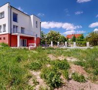 A family house on Sládkovičova Street in Modra is surrounded by a grassy plot.
