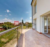 The terrace of a family house on Sládkovičova Street in Modra with a view of the garden.