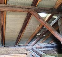 A view of the wooden beams of the ceiling in a cabin in Hermanovce.
