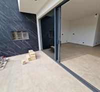 A recreational apartment in Stara Novalja with a terrace, ceramic tiles, and a spacious interior.