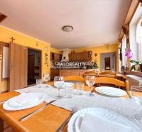 Dining room with set tableware in the interior of hotels and guesthouses, floor with wooden decor.