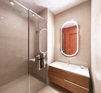 Bathroom with a sink and shower in a 3-room apartment, light tiles.