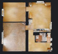 Floor plan of a 3-room apartment with wood-patterned flooring and furniture.