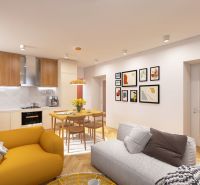 Living room in a three-room apartment with a wooden decor floor and colorful designer furniture.
