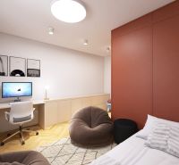 A study in a 3-room apartment with a computer, shelves, and a wooden decor floor.