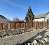 A family house with a garden and fencing in Vrakúň, residential plots.