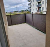 Balcony in a 3-room apartment in the photo from the street in Dunajská Streda, Unspecified.