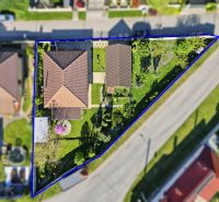 A family house with a yard and garden in Kostolné Kračany, visible from the air.