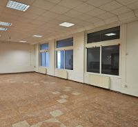 Spacious commercial spaces with large windows and tiling, ideal for business.
