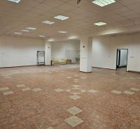 Spacious commercial spaces with tiling and seating.