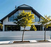 A family house in Dolný Štál with a glass facade and minimalist design.