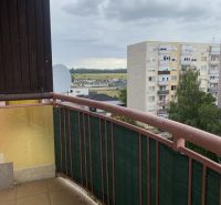 A view from the balcony of a one-room apartment in Dunajská Streda, overlooking residential blocks.