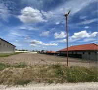 Holice offers a view of plots - living with a blue sky and houses.