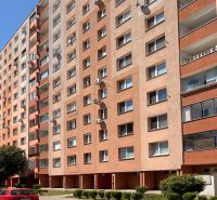 Apartment building on Lachova Street in Petržalka, Bratislava, with parking and greenery.