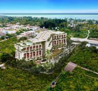 Apartment construction in Paje, Unguja South, surrounded by greenery and close to the coast.