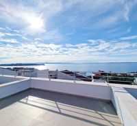Sea view from the terrace of a 3-room apartment in Petrčane on a sunny day.