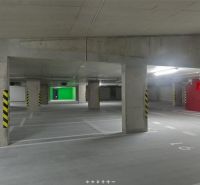 Underground garage on Košická Street in Bratislava-Ružinov with marked parking spaces.