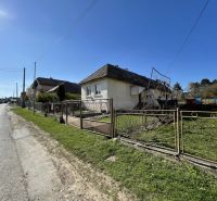 A family house on Tehelná Street in Drienov with a shabby fence and a garden.