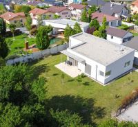 A family house on Fialkova Street in Galanta-Kolónia with a large garden and adjacent trees.