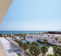 View from a 2-bedroom apartment of a palm-lined street and the sea in El Puig.