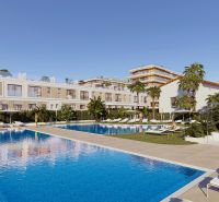 Apartments with a pool and palm trees in El Puig. A relaxing atmosphere for comfortable living.