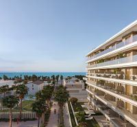 A view of the coastal buildings and palm trees in El Puig near the two-bedroom apartments.