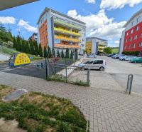 Playground and parking lot on Mateja Bela Street in Žilina near a 2-room apartment.