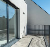 Terrace of a family house on Kľukatá Street in Bratislava - Prievoz with a tiled floor.